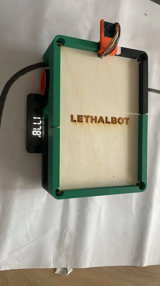 The finished LethalBOT on a scale reading 1.778 kg